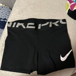 nike pros size L